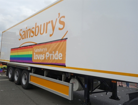 Picture of Sainsbury's truck with "Sainsbury's loves Pride" banner